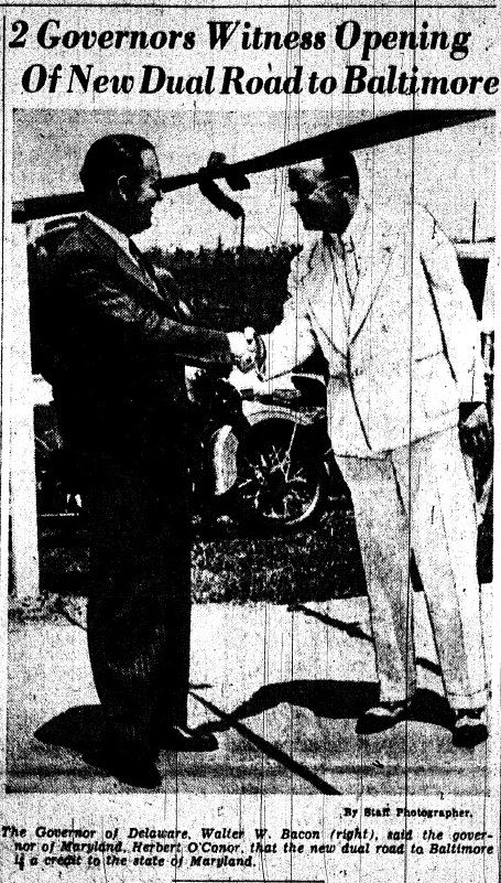 Governor Walter W. Bacon of Delaware and Governor Hebert O'Conor of Maryland meet at the ribbon stretched across Route 40. source: Journal Every Evening, Wilmington, DE., June 26, 1941