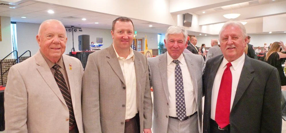 Skip Mahan, Sheriff Adams, County Executive Alarm McCarthy, and Singerly Fire Company firefighter Hampton Scott